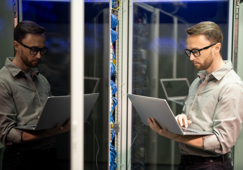 Technician Providing IT Support at Client Location Smart Office & Business IT Modernization